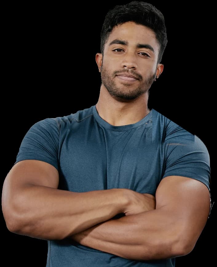 A fit man in a training t-shirt with his arms crossed
